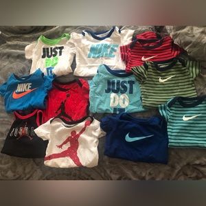 11 name brand onesies 0-3 and 3 m